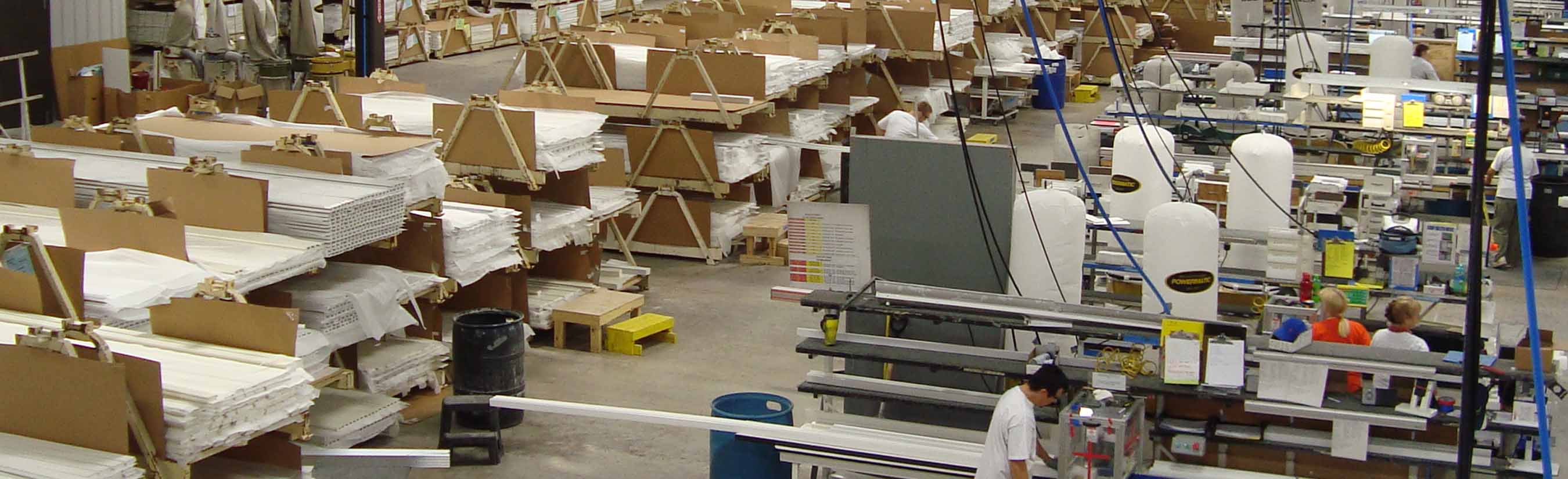 Inside of a Sunburst Factory with staff working.