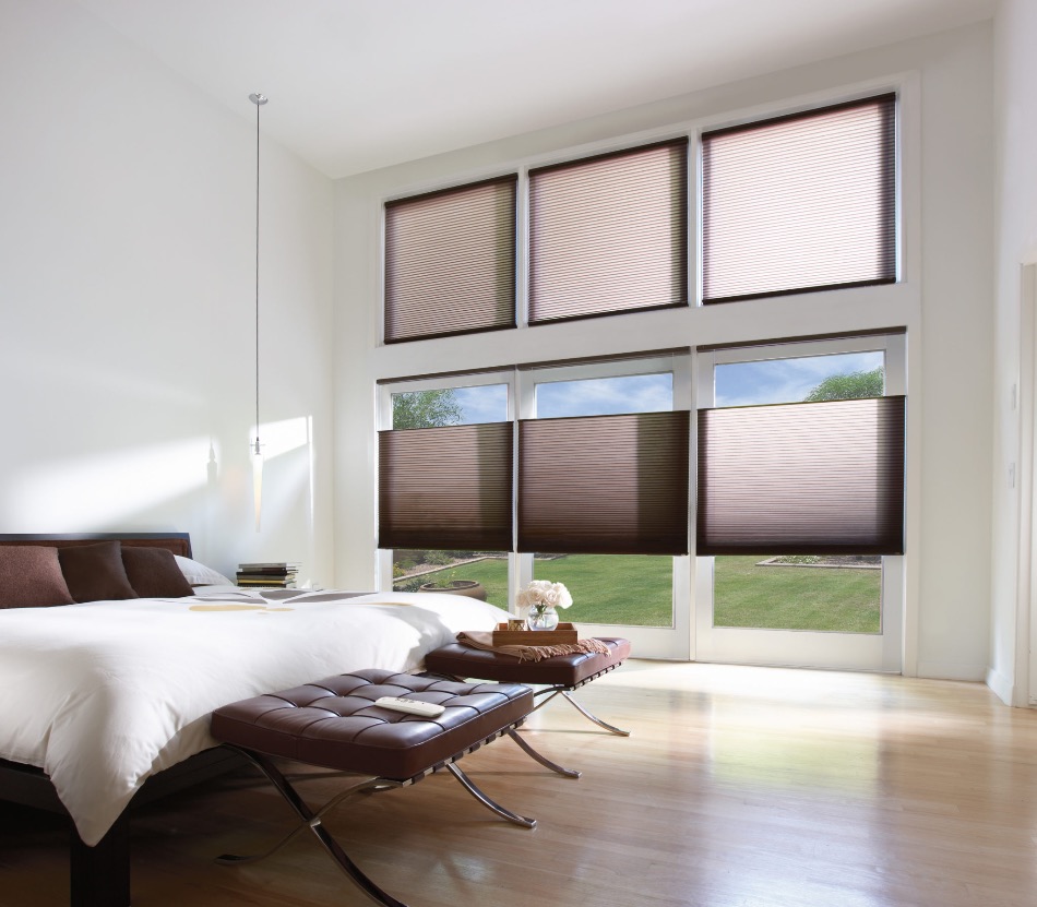 Brown cell shades in a bedroom