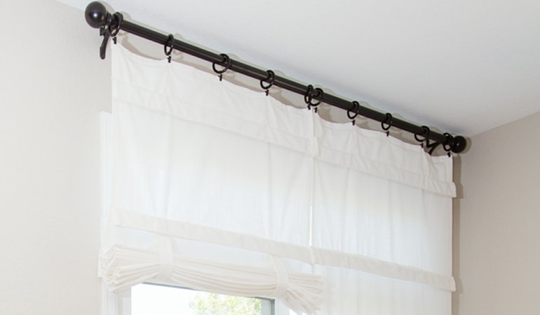 Tumble shades in Denver give your doors privacy versatility and style. White tumble shade on double glass doors